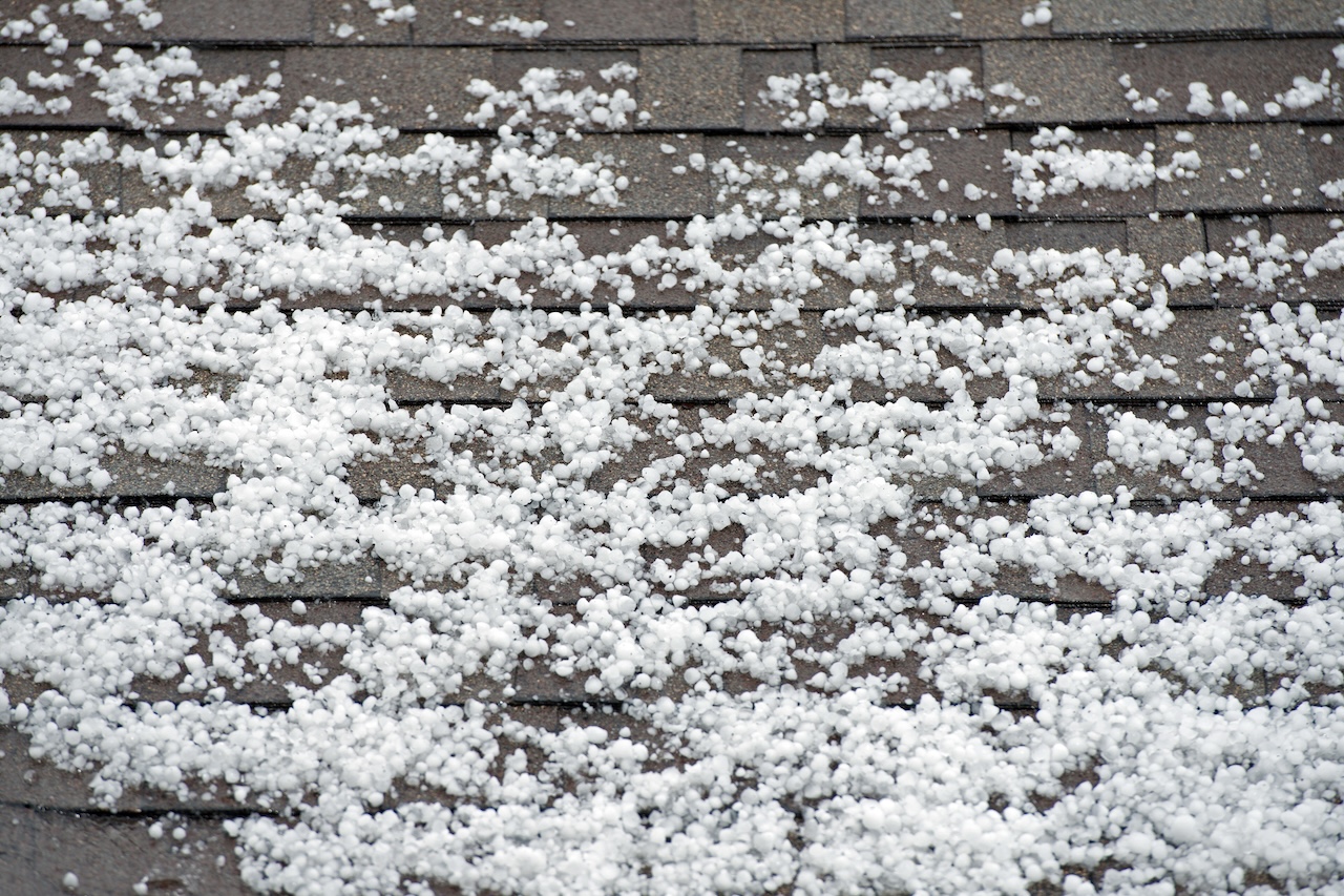 Hail on the Roof. After Heavy Storm with Hail. Roof Closeup.