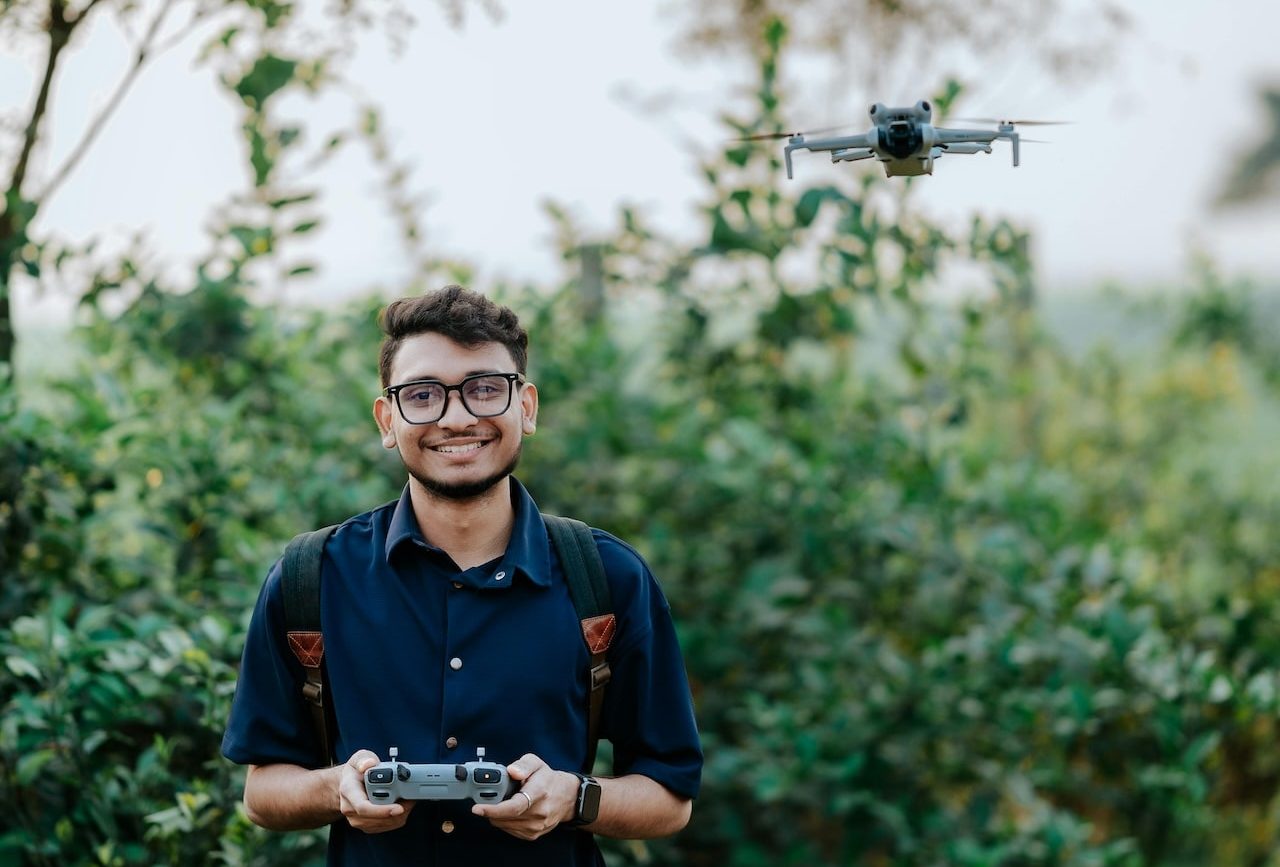 roofer preparing to fly a drone and inspect a roof